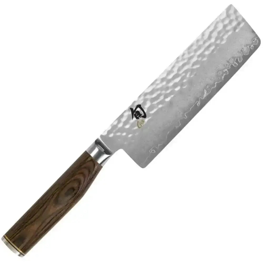Shun chef's knife with wooden handle on a white background