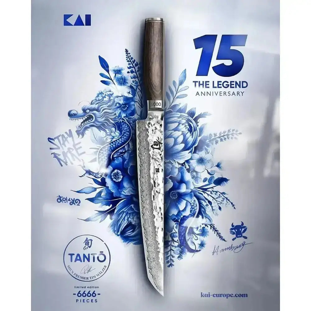 Decorative knife with blue floral design and 'KAI' branding on a white background