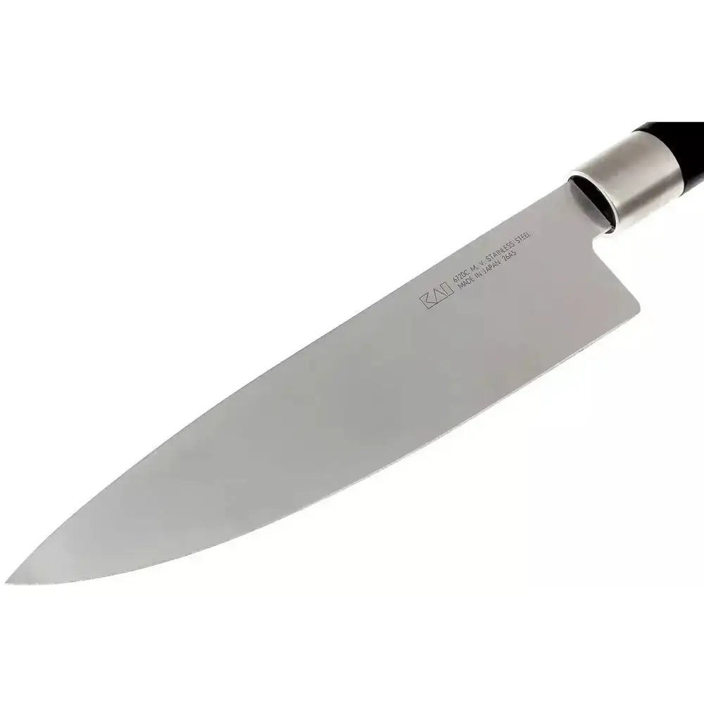 Chef's knife with a silver blade and black handle on a white background