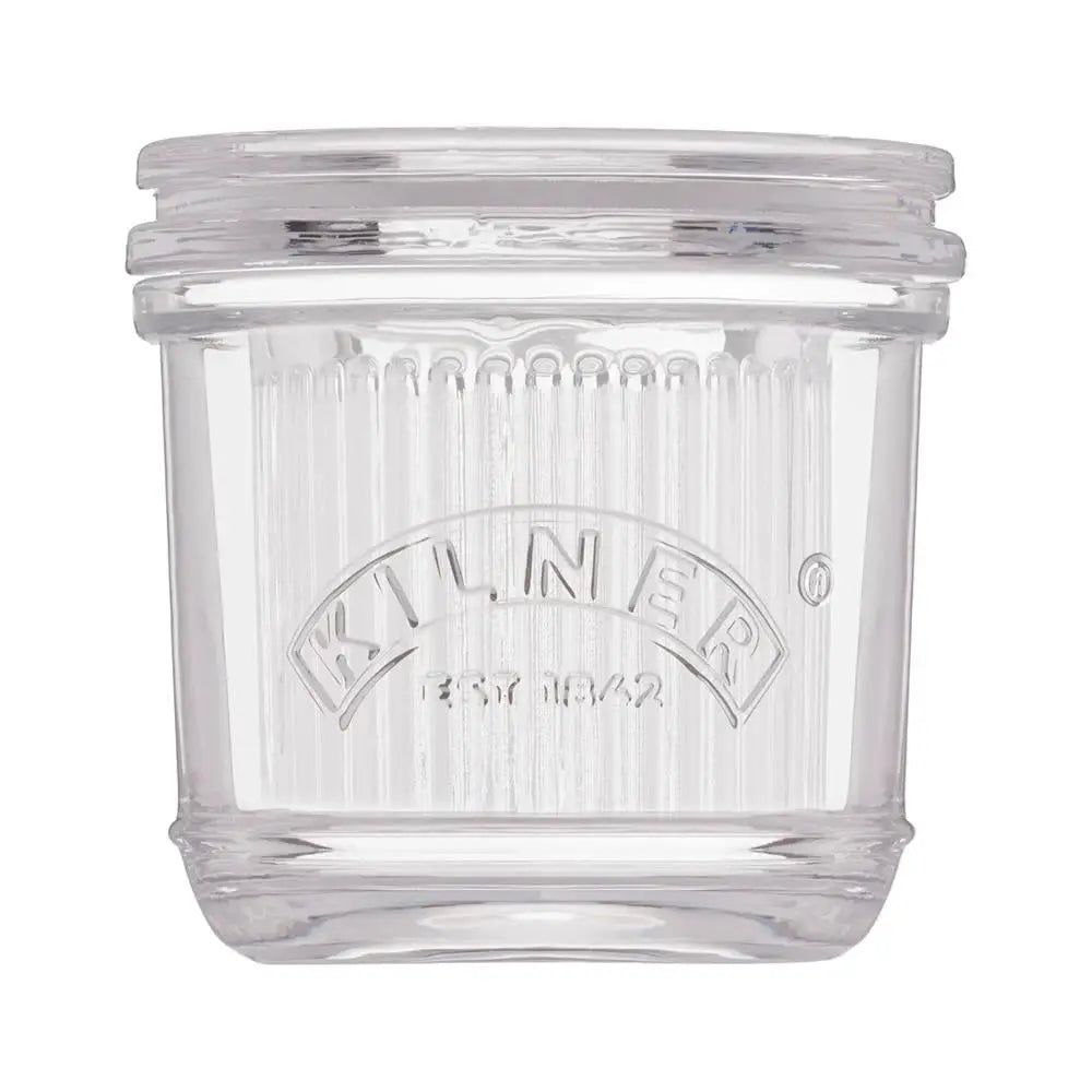 Clear glass jar with Kilner branding on a white background