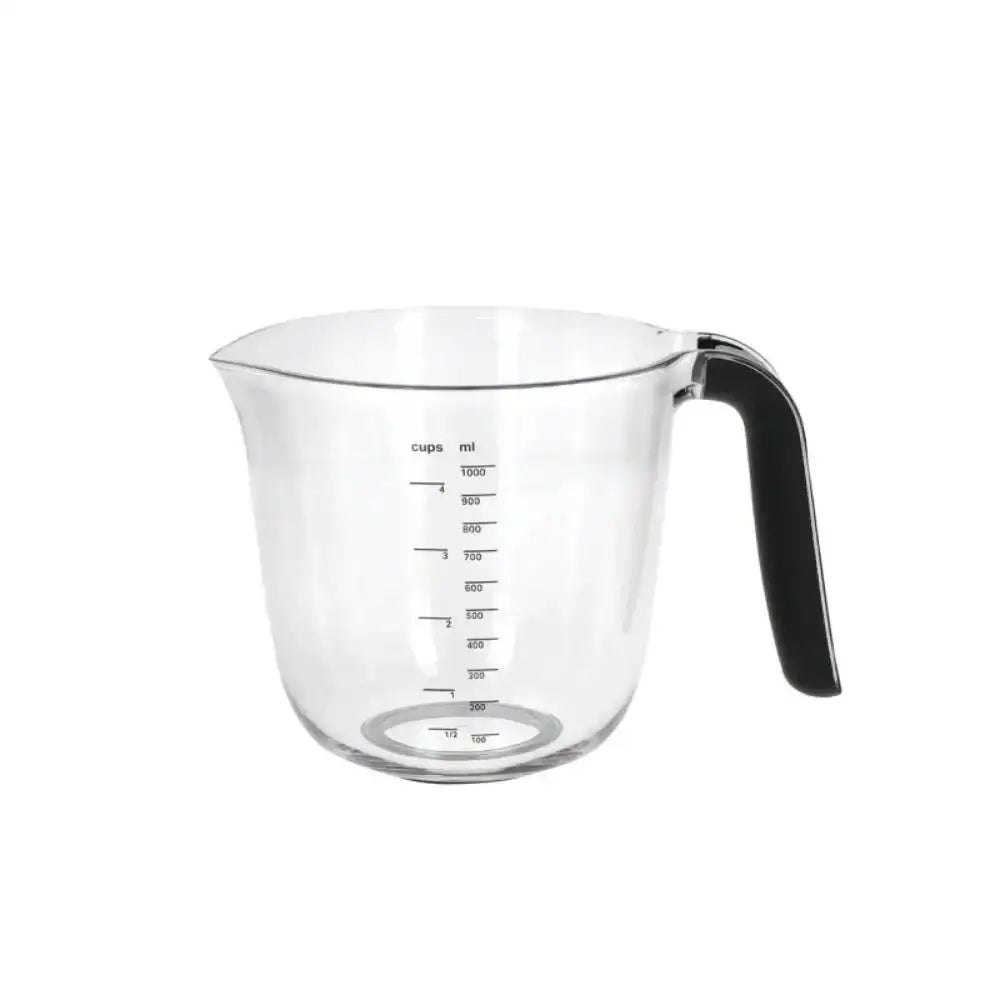 Clear measuring cup with black handle on a white background