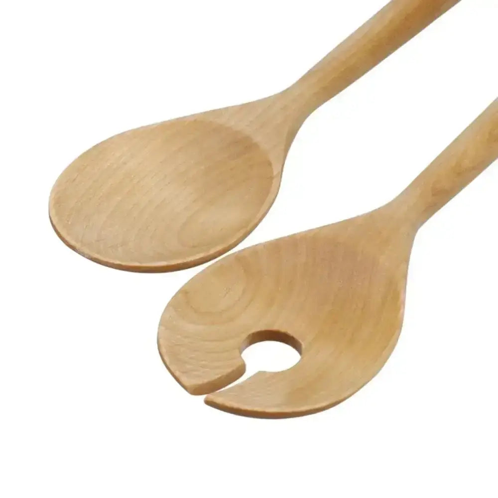 Two wooden spoons on a white background