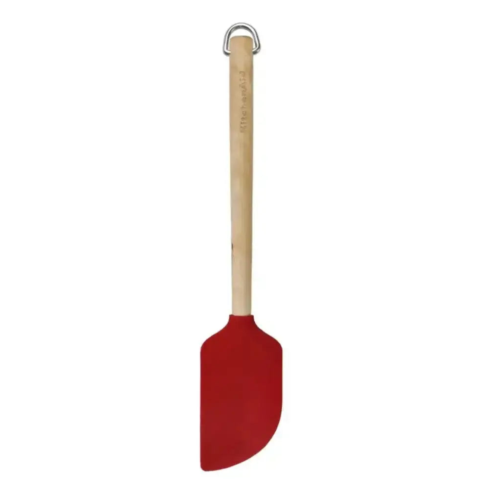 Red spatula with a wooden handle on a white background
