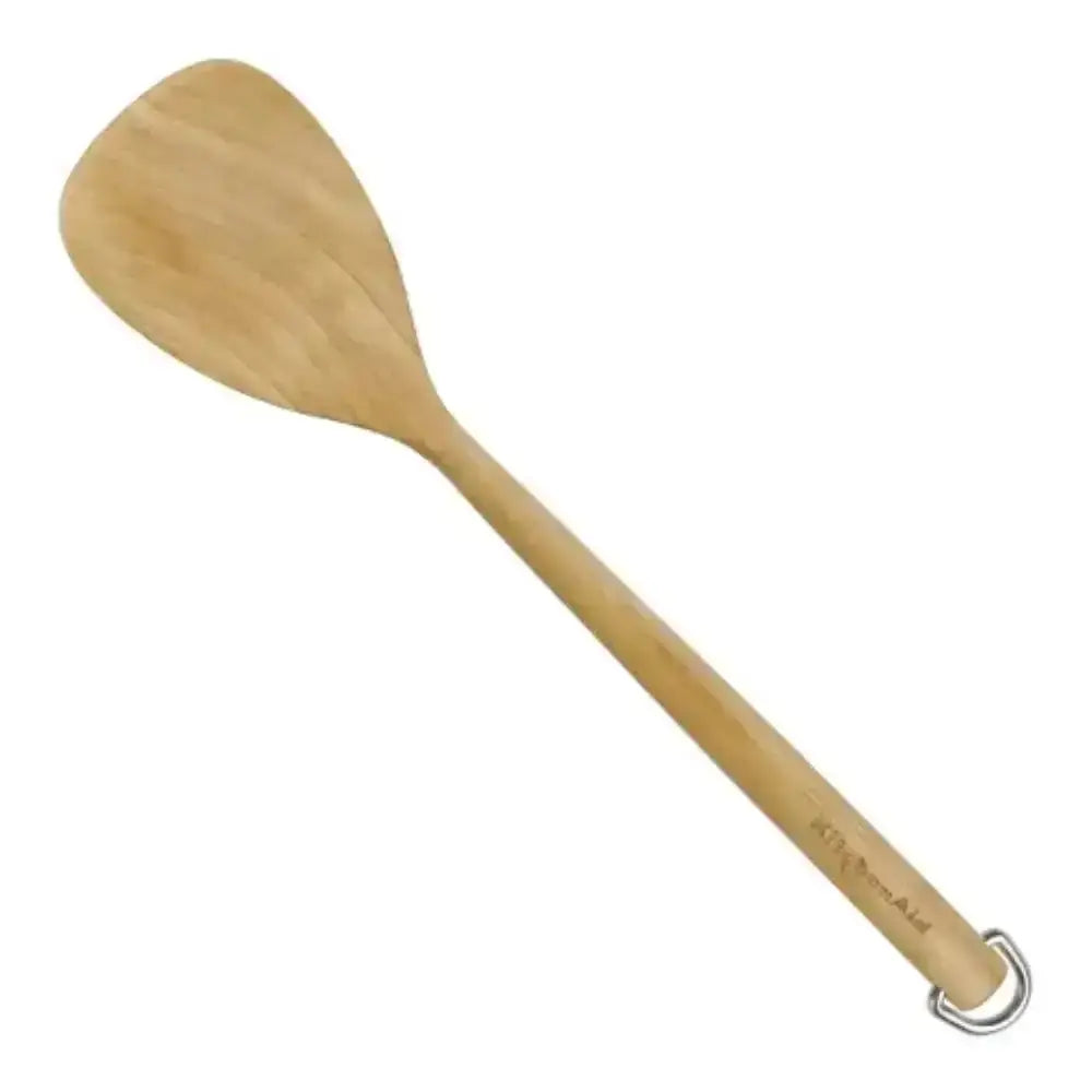 Wooden spatula with a ring handle on a white background