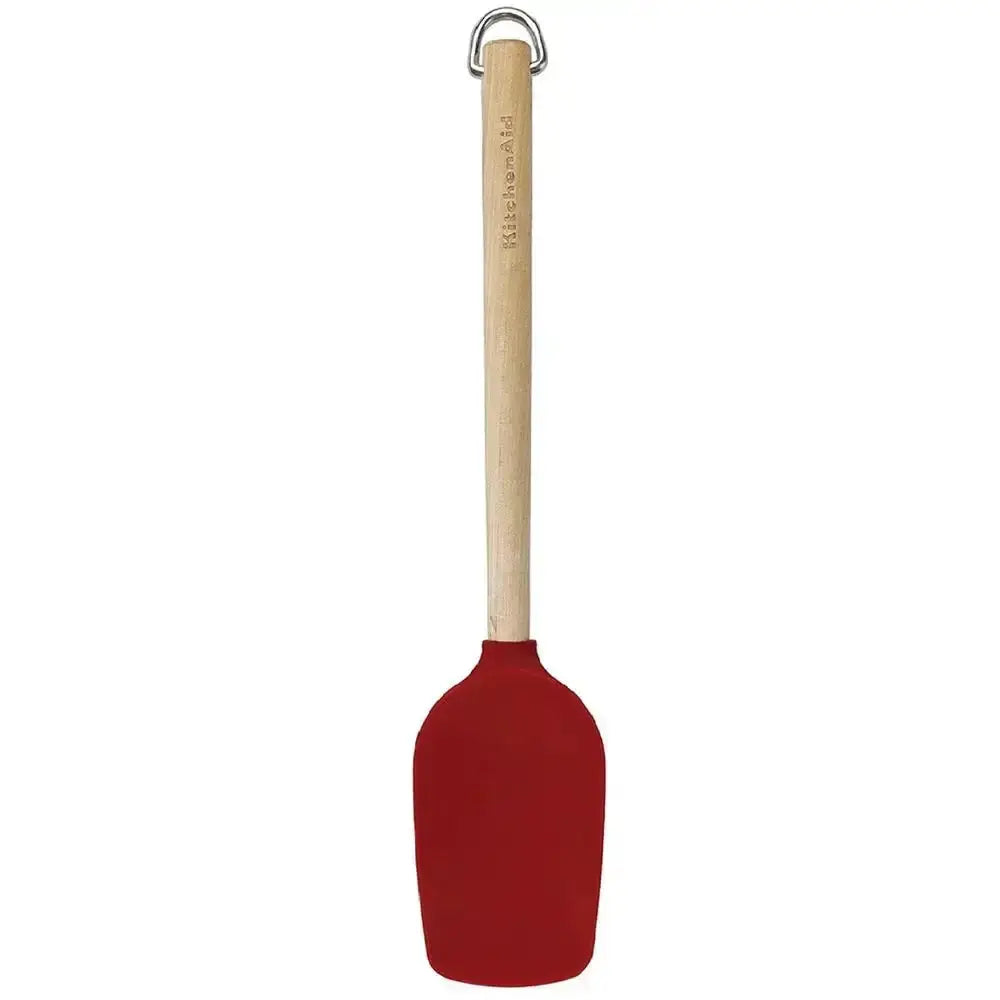 Red spatula with a wooden handle on a white background