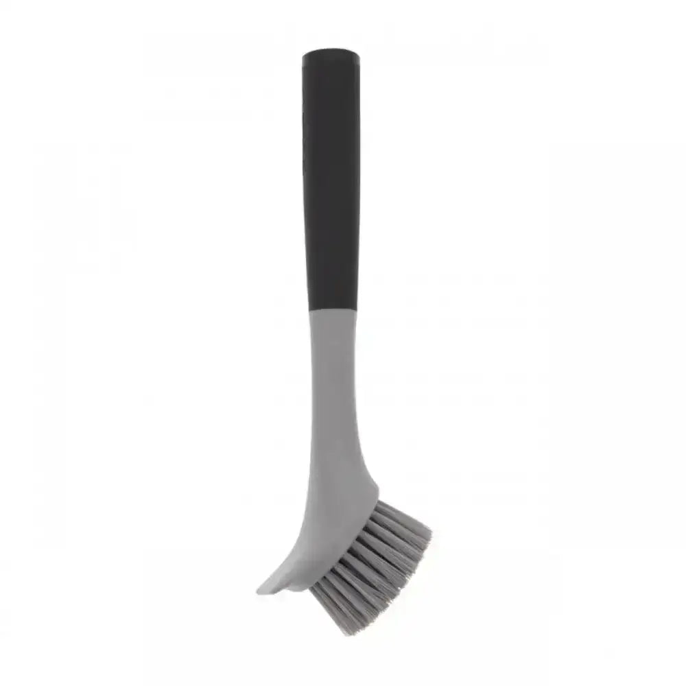 Gray scrub brush with black handle on a white background