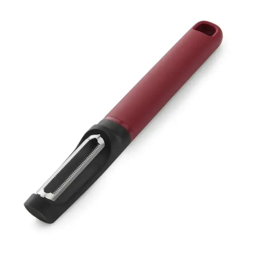 Red vegetable peeler on a white background