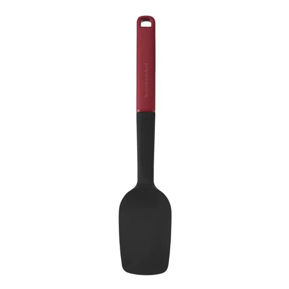 Black spatula with a red handle on a white background