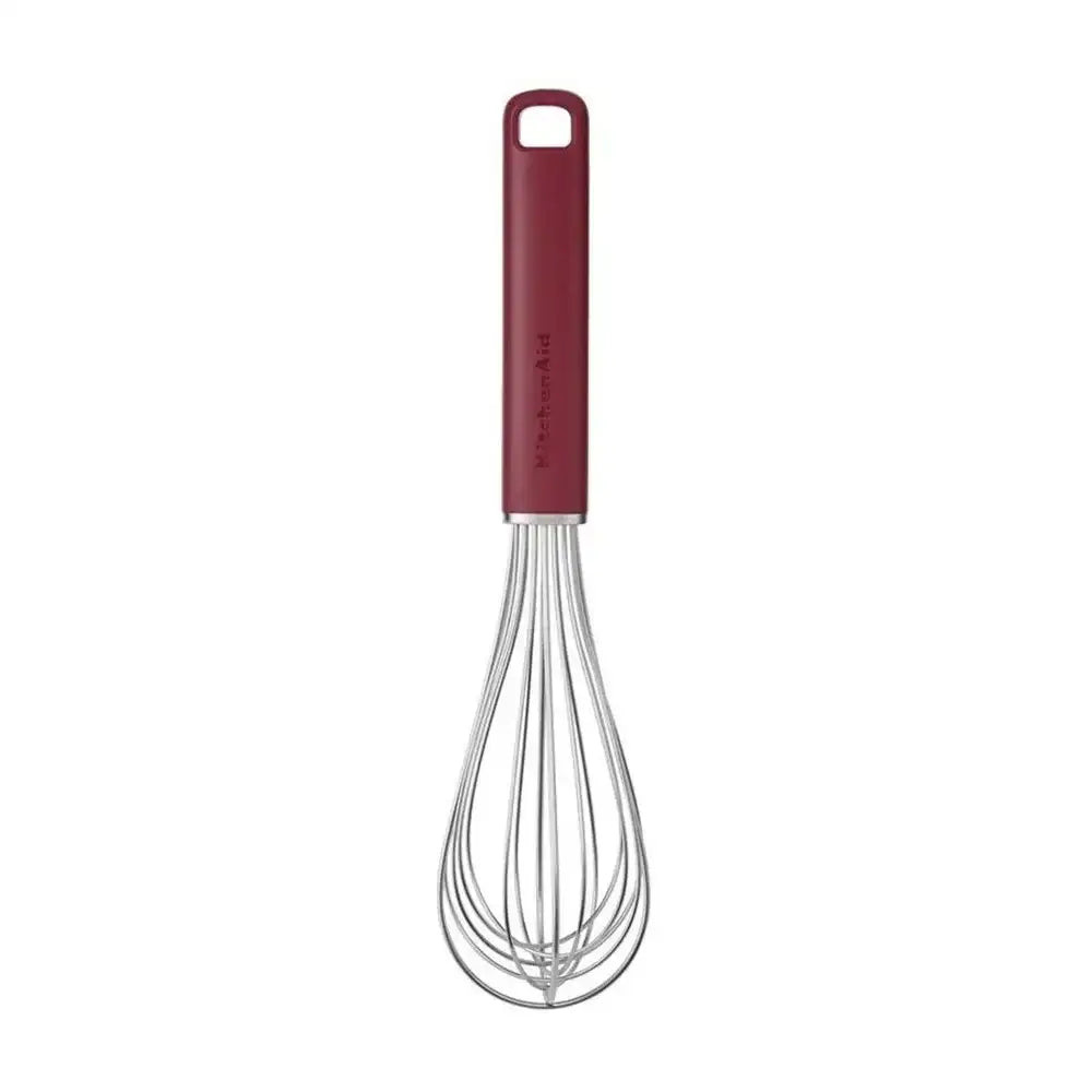 Red-handled whisk on a white background