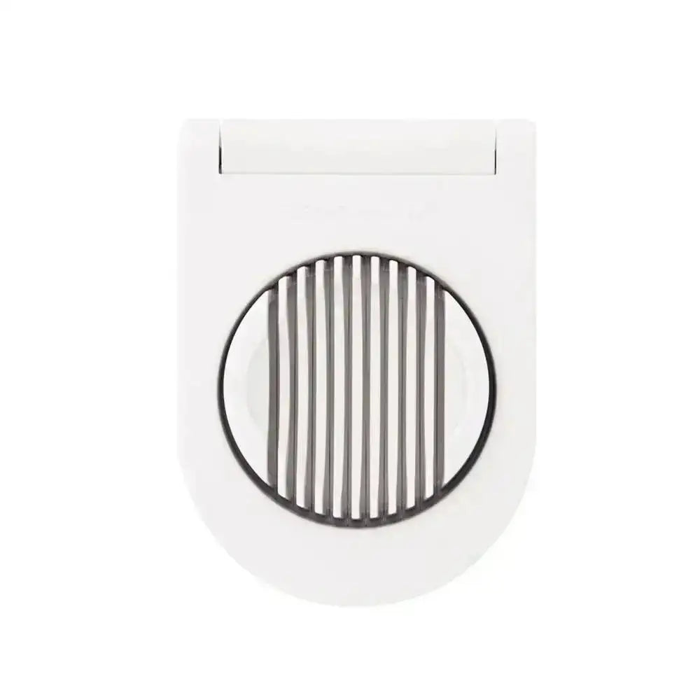 Egg Slicer with blades with black circular design on a white background