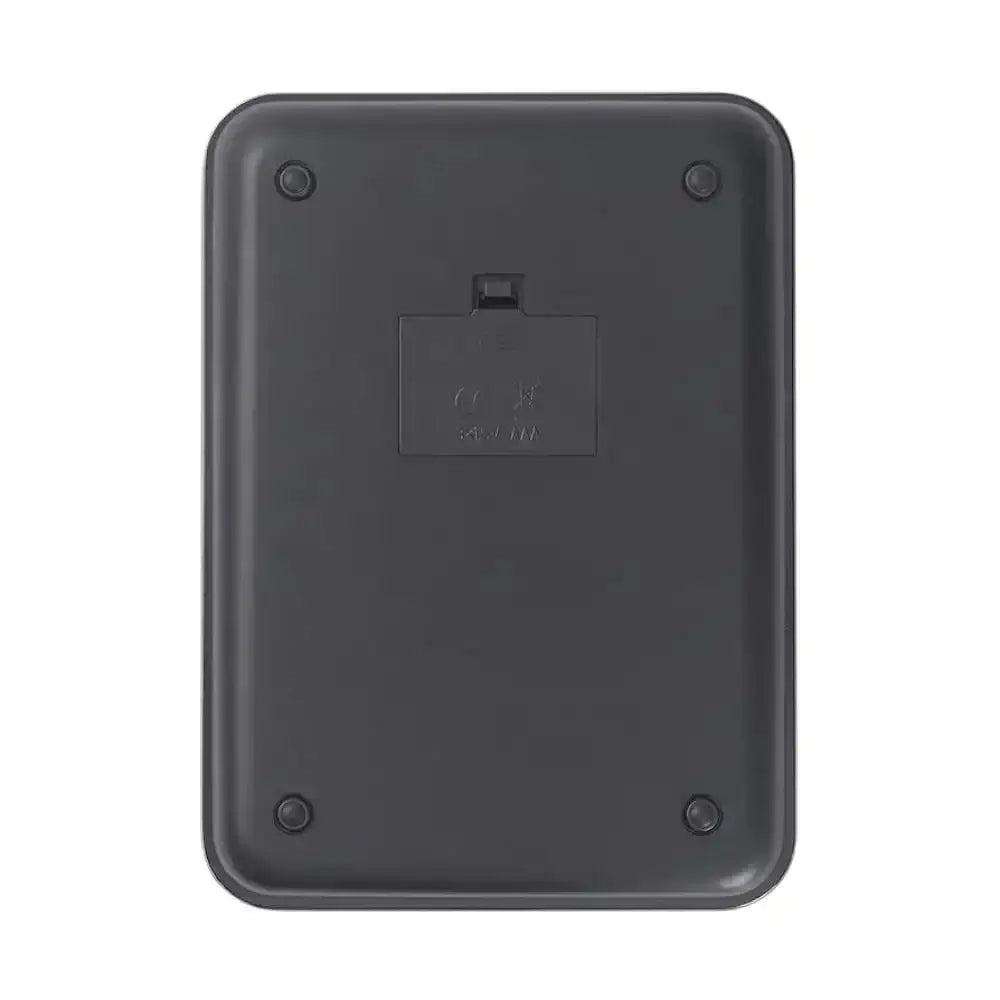 Black rectangular kitchen scales bottom with a battery compartment on a white background