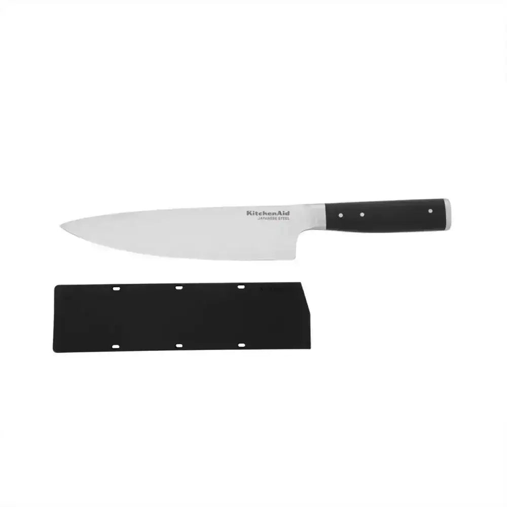 Chef's knife with black handle and black sheath on a white background