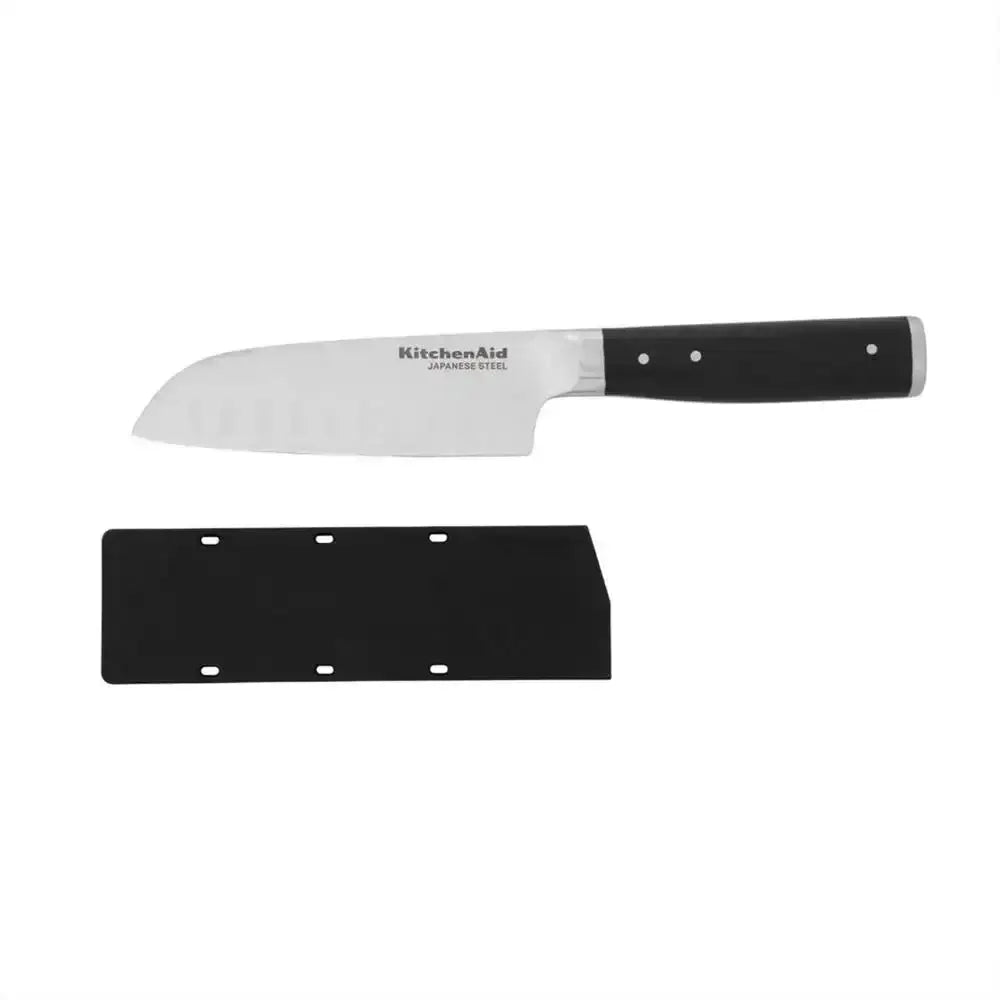 KitchenAid chef's knife with black handle and blade cover on a white background
