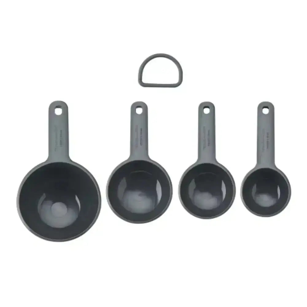 Set of five gray measuring cups with a ring on a white background