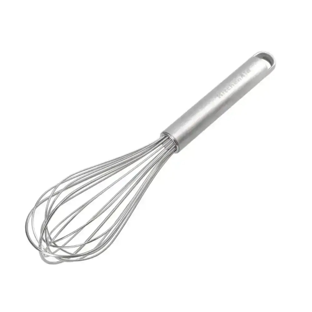 Metal whisk with a handle on a white background