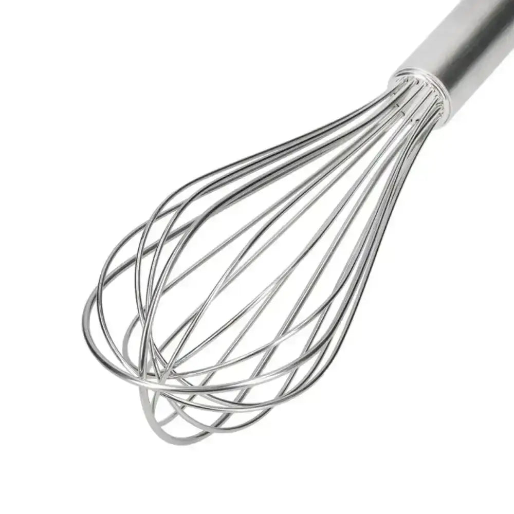Metallic whisk on a white background