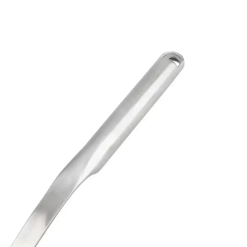 Metallic spoon on a white background