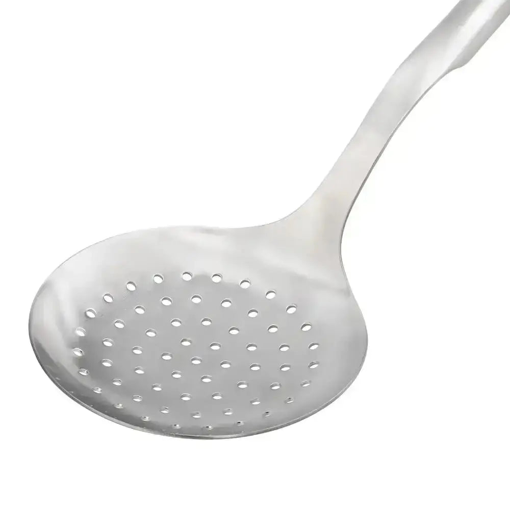 White perforated cooking spoon on a white background