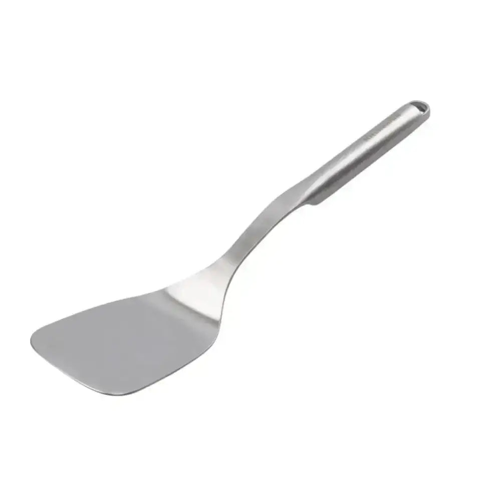 Metal spatula on a white background