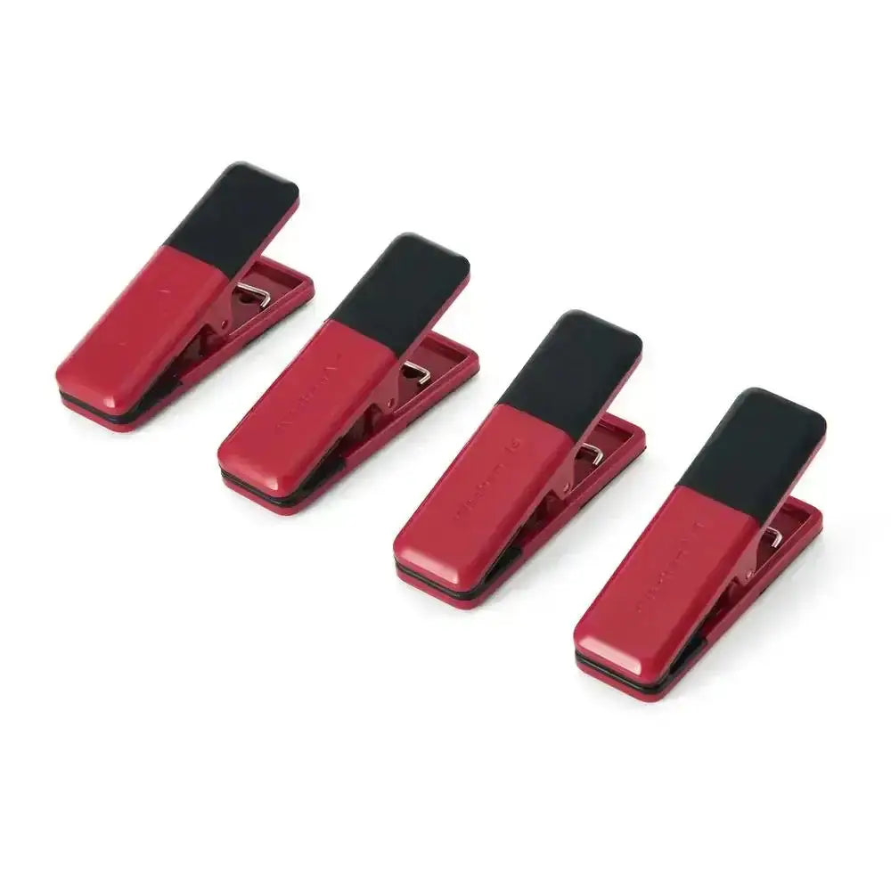 Four red and black clips on a white background