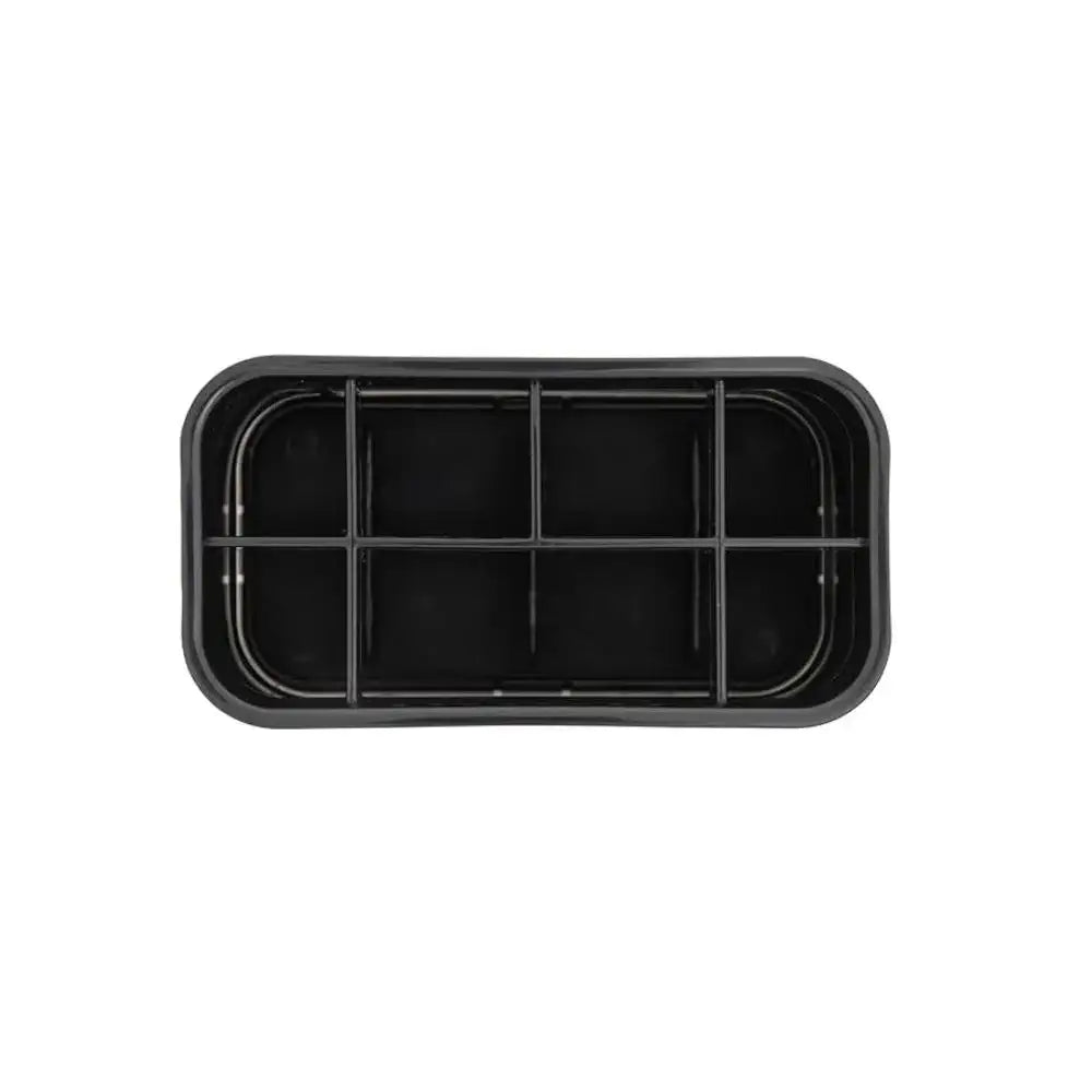 Black plastic tray with compartments on a white background