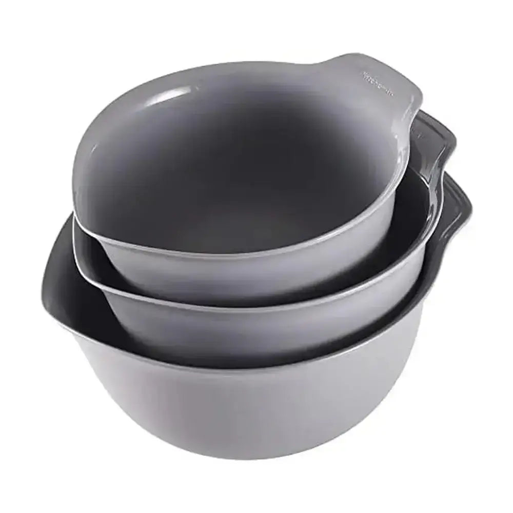 Set of three gray mixing bowls stacked on a white background