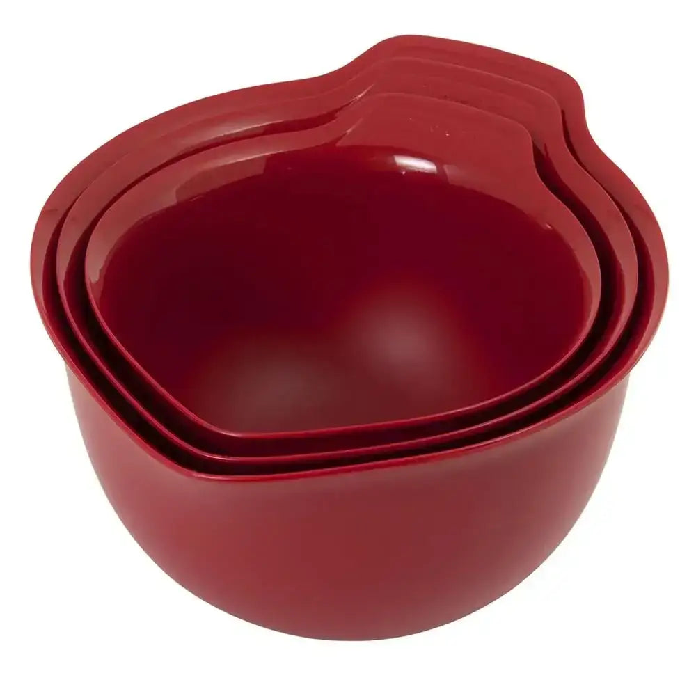 Set of red mixing bowls stacked on a white background