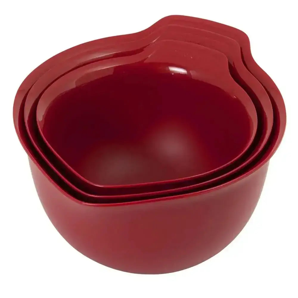 Set of red mixing bowls stacked on a white background