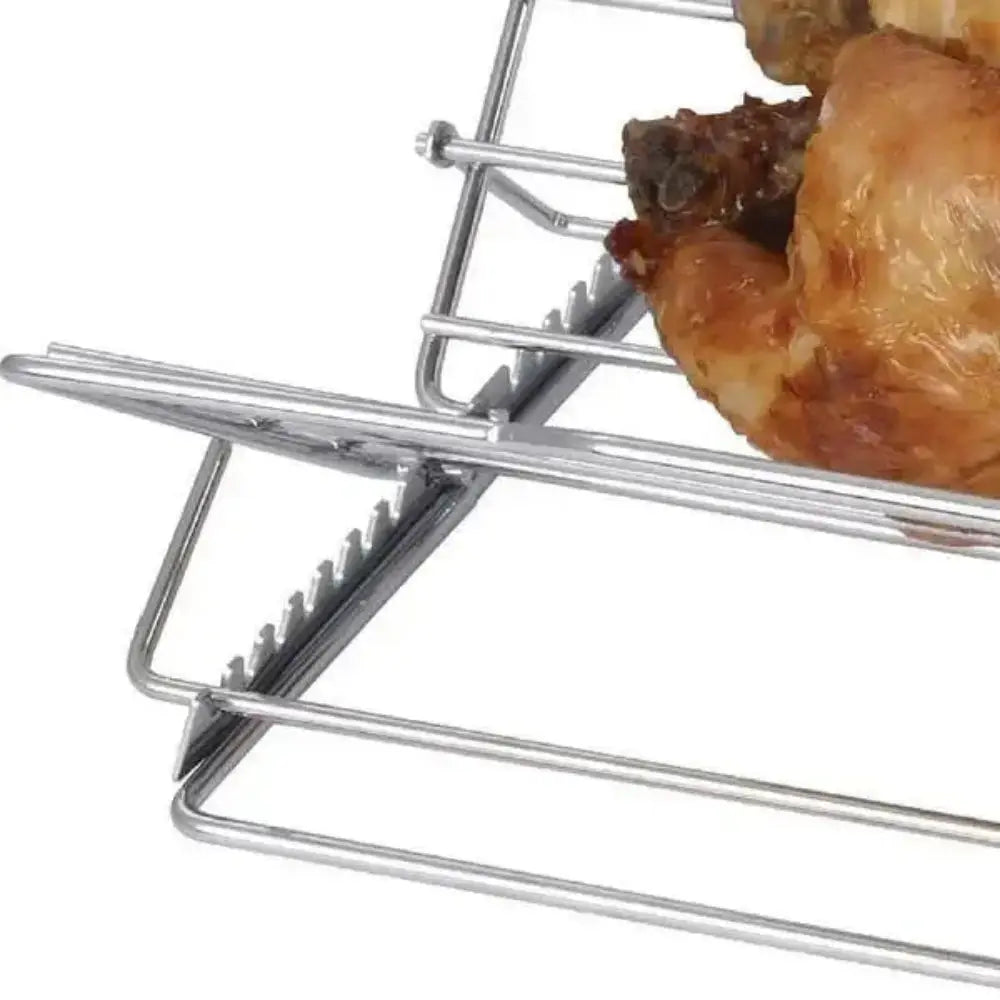 Metal roasting rack with a roasted chicken on a white background
