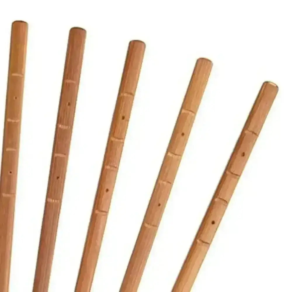 Set of six wooden sticks on a white background