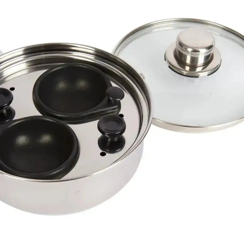 Stainless steel pot with black interior and glass lid on a white background