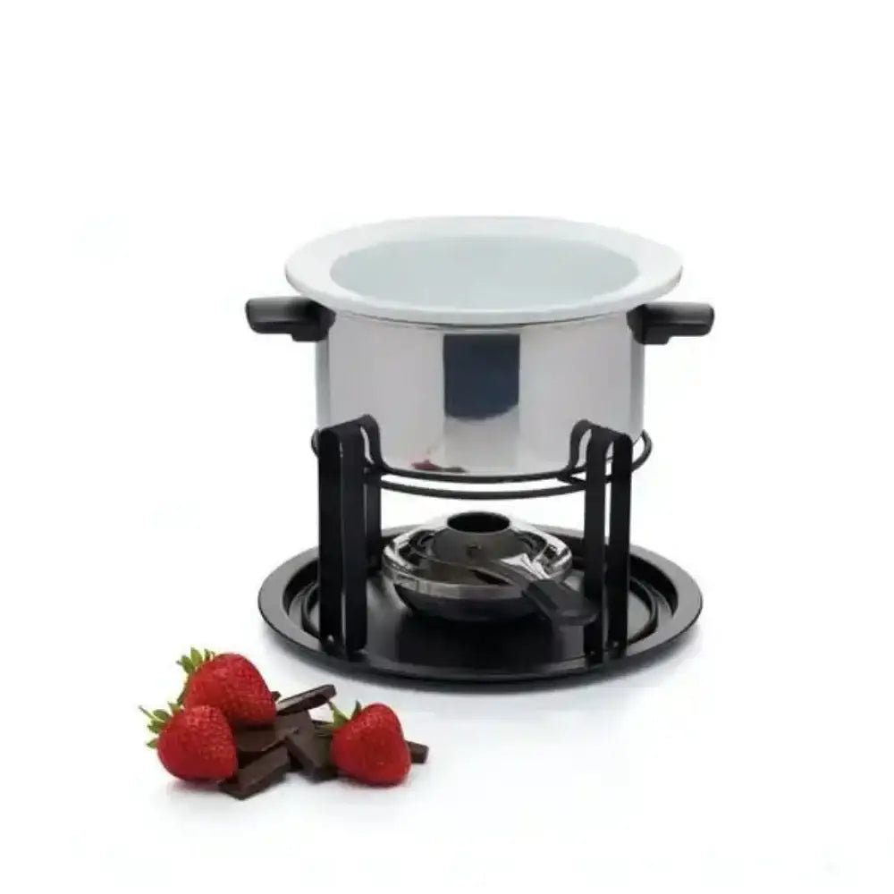 Stainless steel fondue pot with strawberries and chocolate on a white background