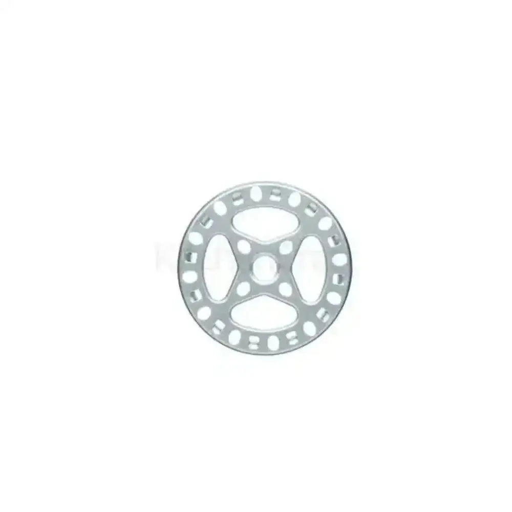 Metallic gear-like object on a white background
