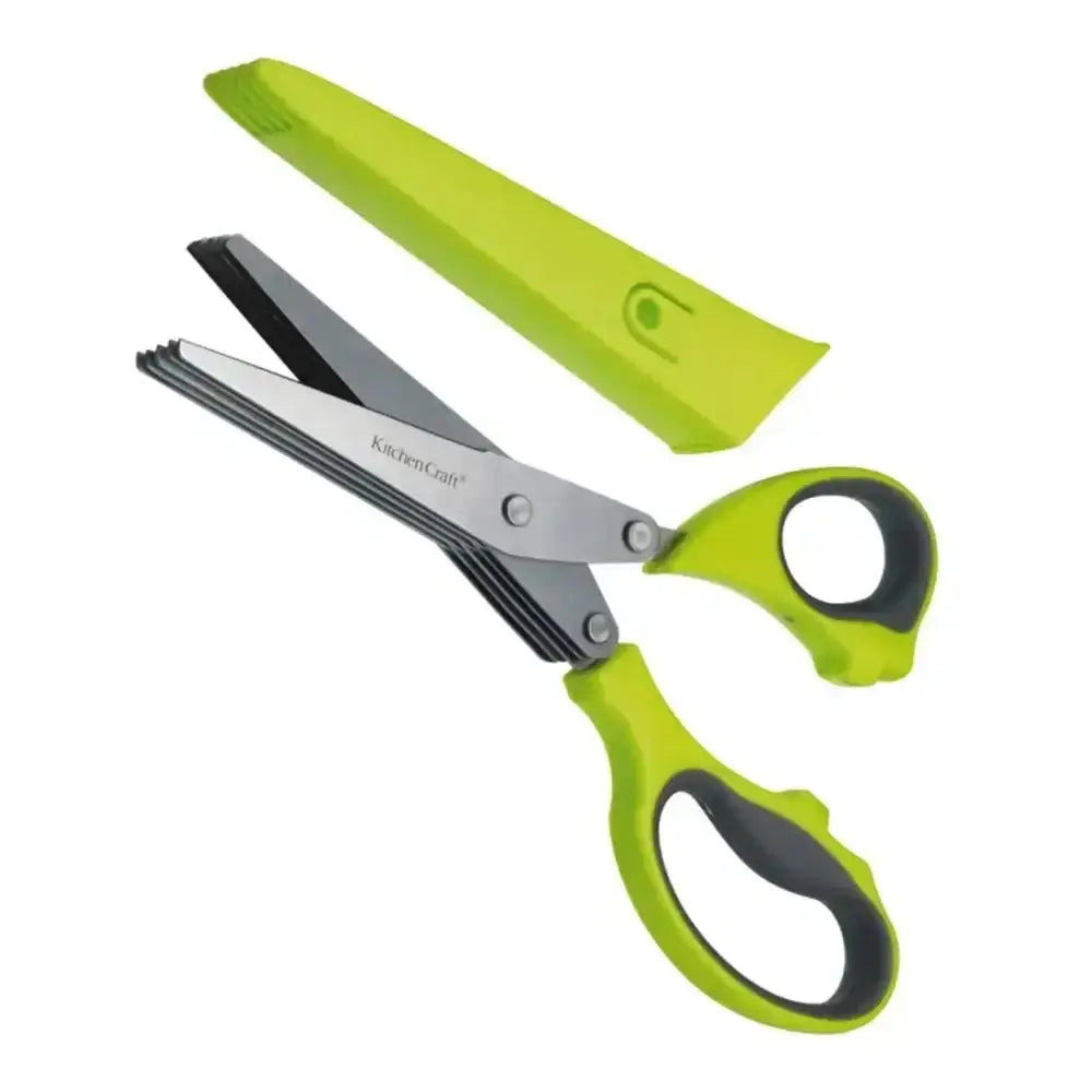 Green kitchen shears with a black handle on a white background