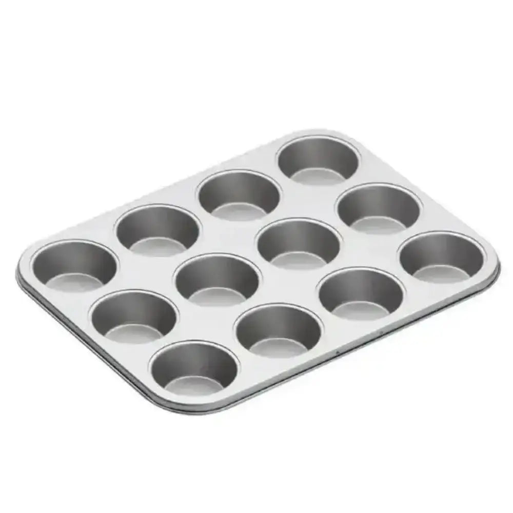 Metal muffin tin with 12 cups on a white background