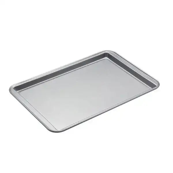 KitchenCraft non-stick oven tray 43cm rectangular metallic baking sheet with smooth reflective surface and raised edges