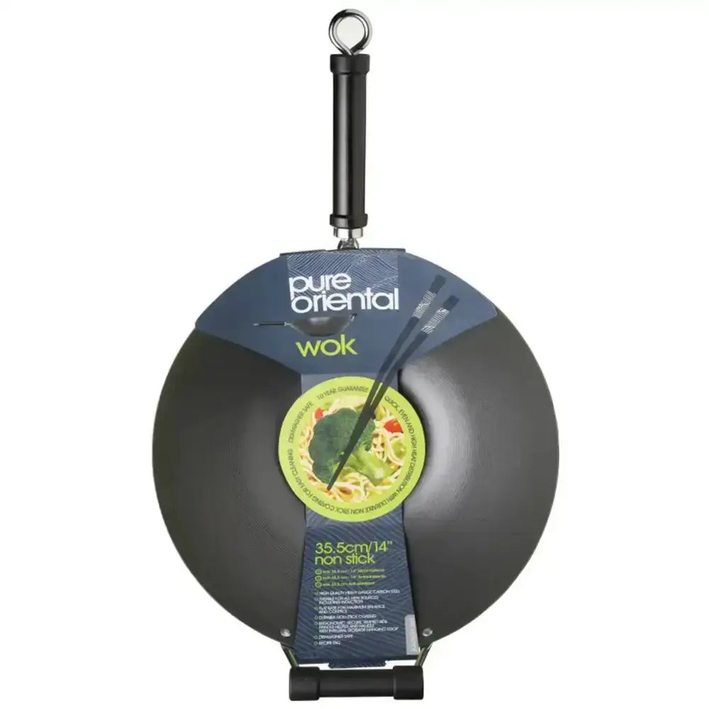 Black wok with packaging featuring 'pure oriental' branding on a white background