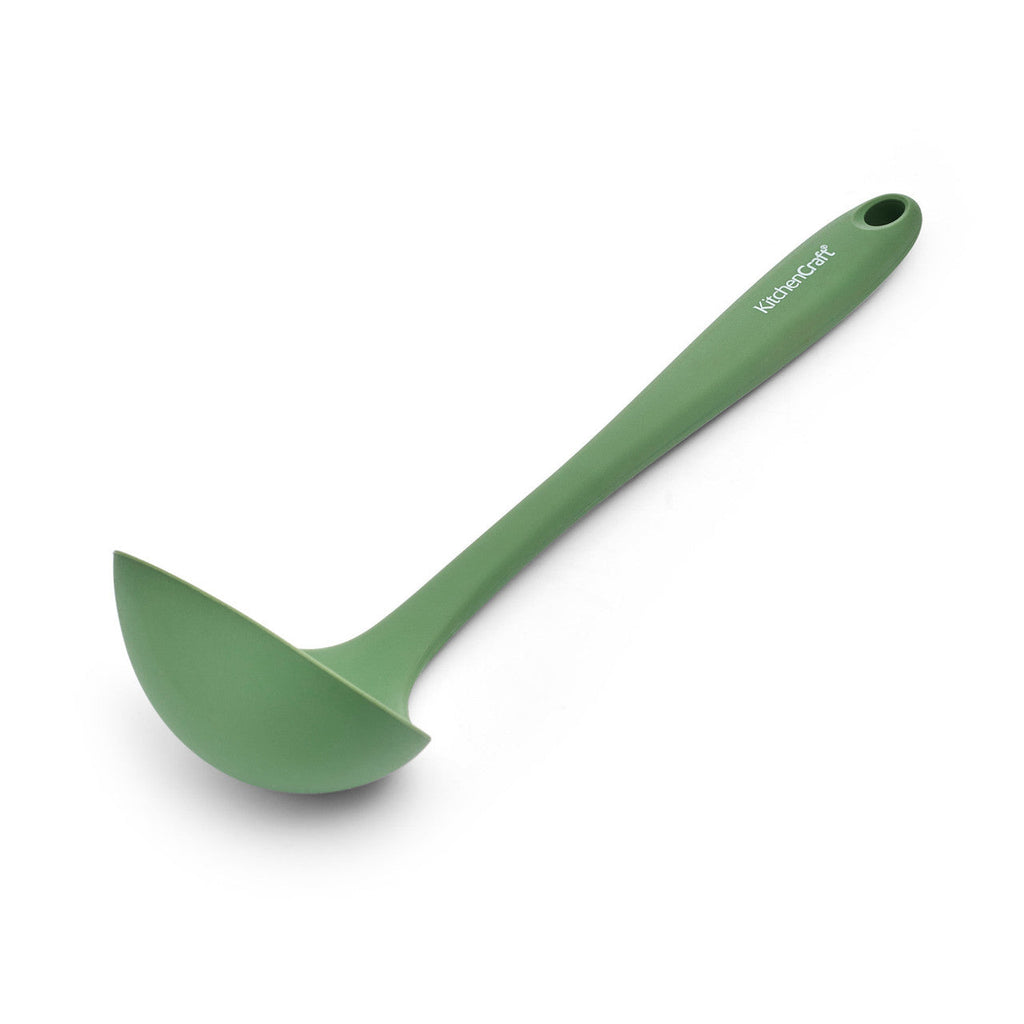 Green ladle with 'Kitchen Craft' branding on a white background