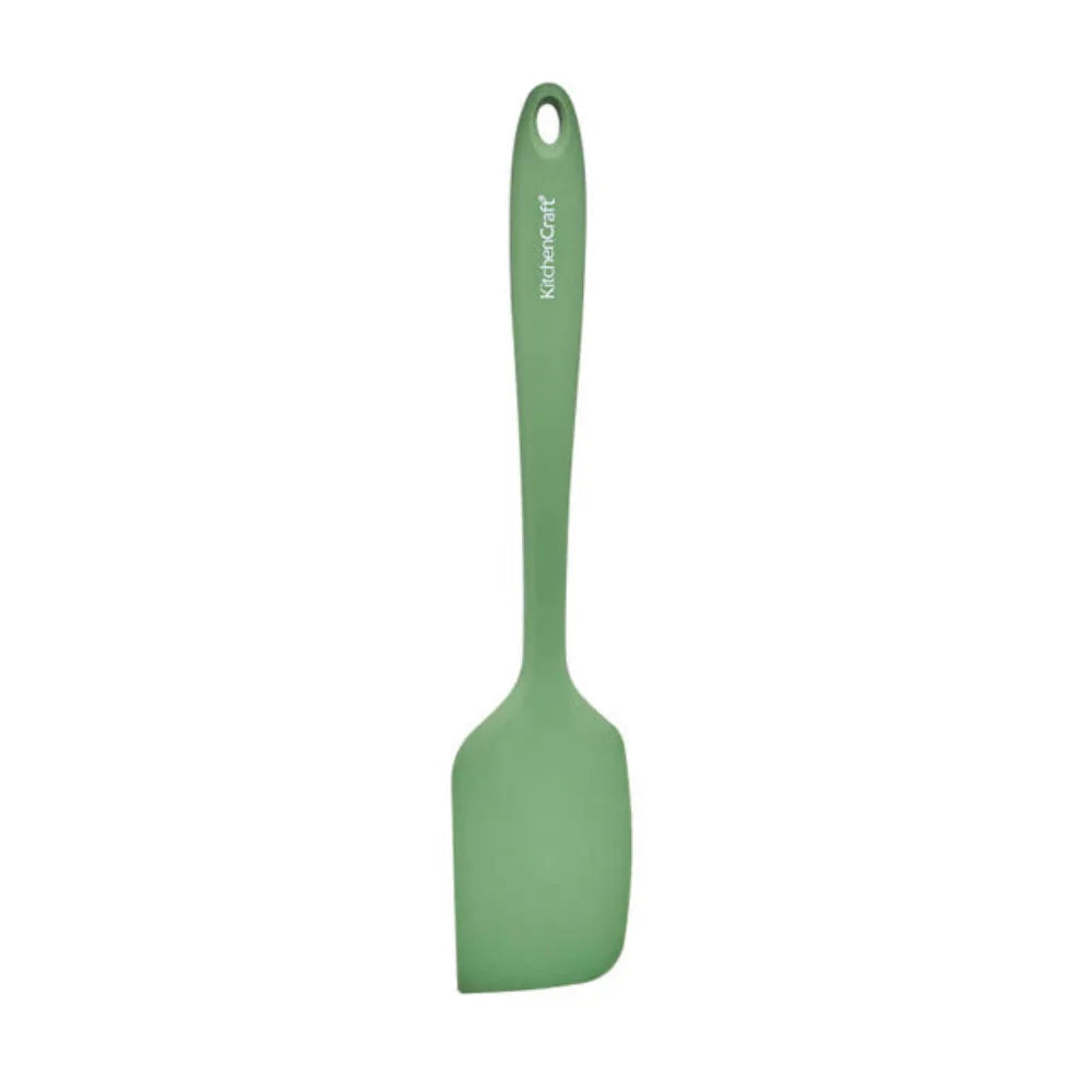 Green spatula with a handle on a white background