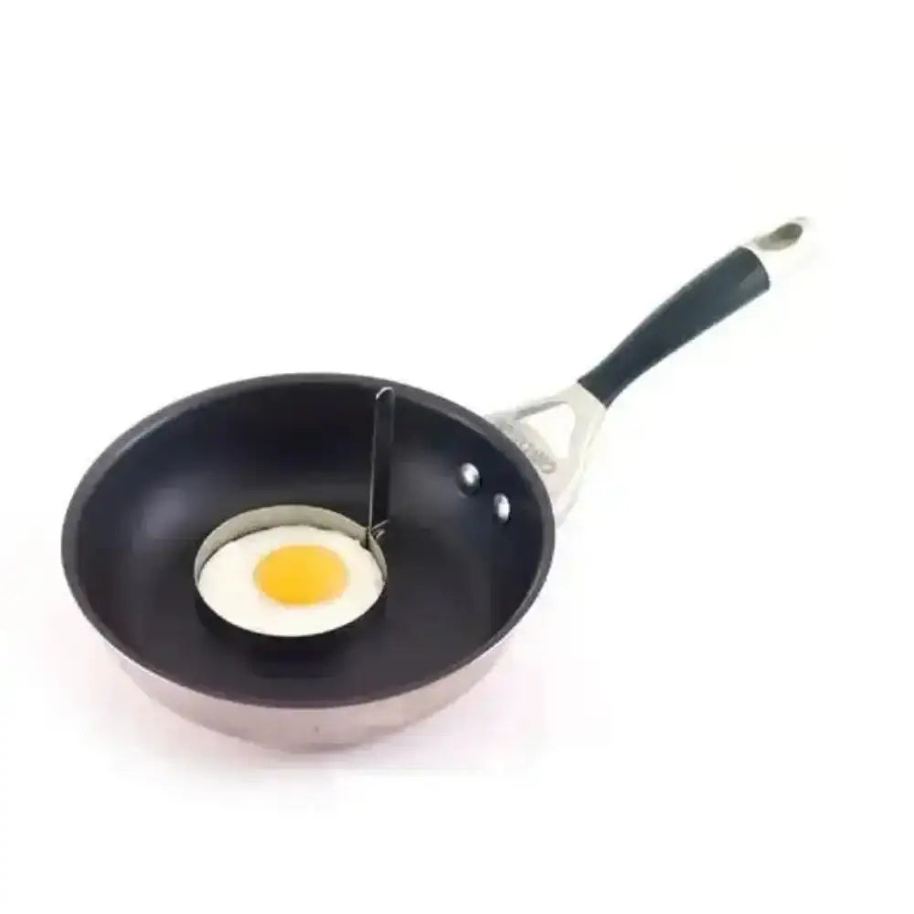 Frying pan with a fried egg on a white background