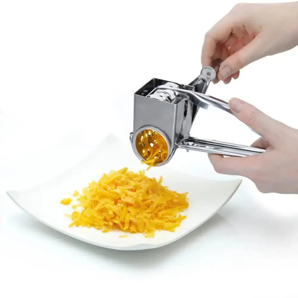 Hand using a cheese grater to shred cheese onto a white plate.