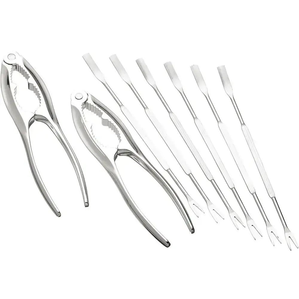 Set of metal kitchen tools including tongs and skimmers on a white background