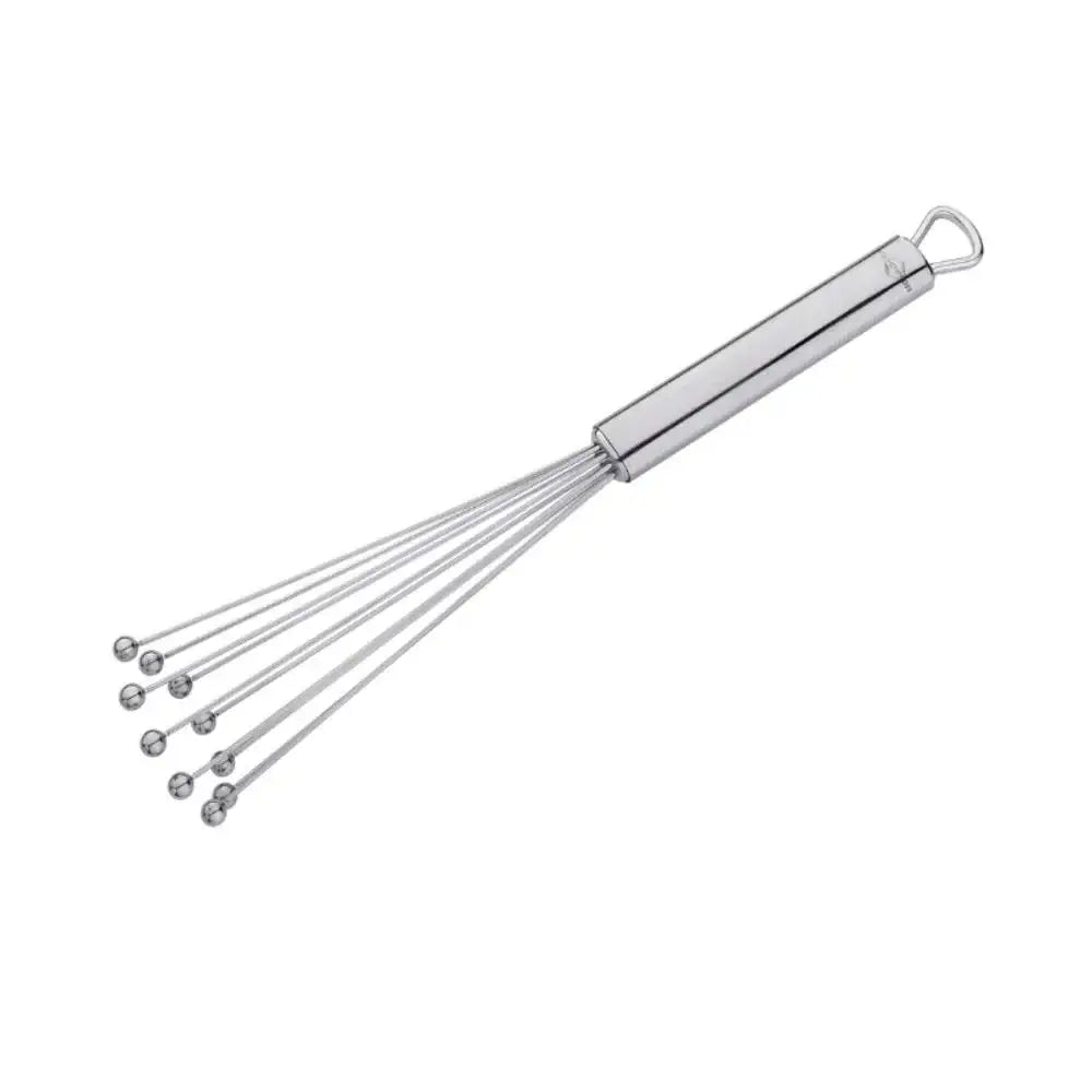 Metal whisk on a white background