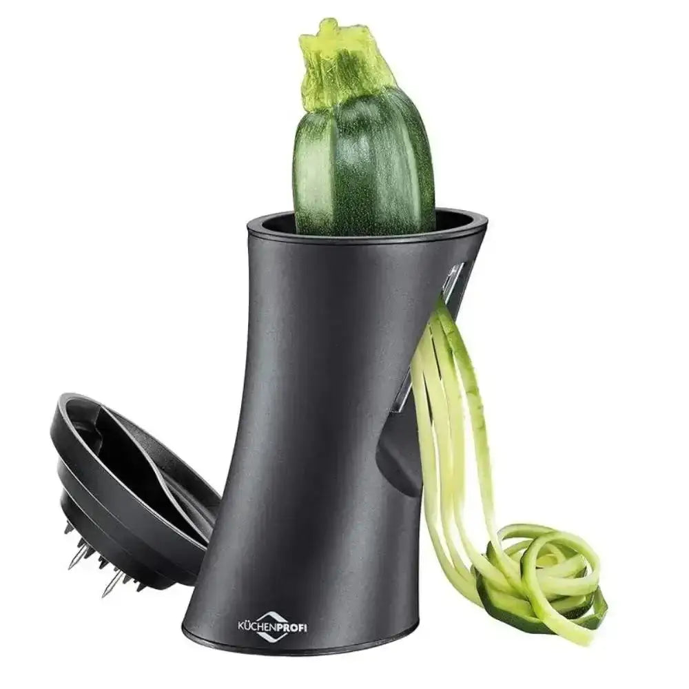 Spiralizer with a zucchini and noodles on a white background