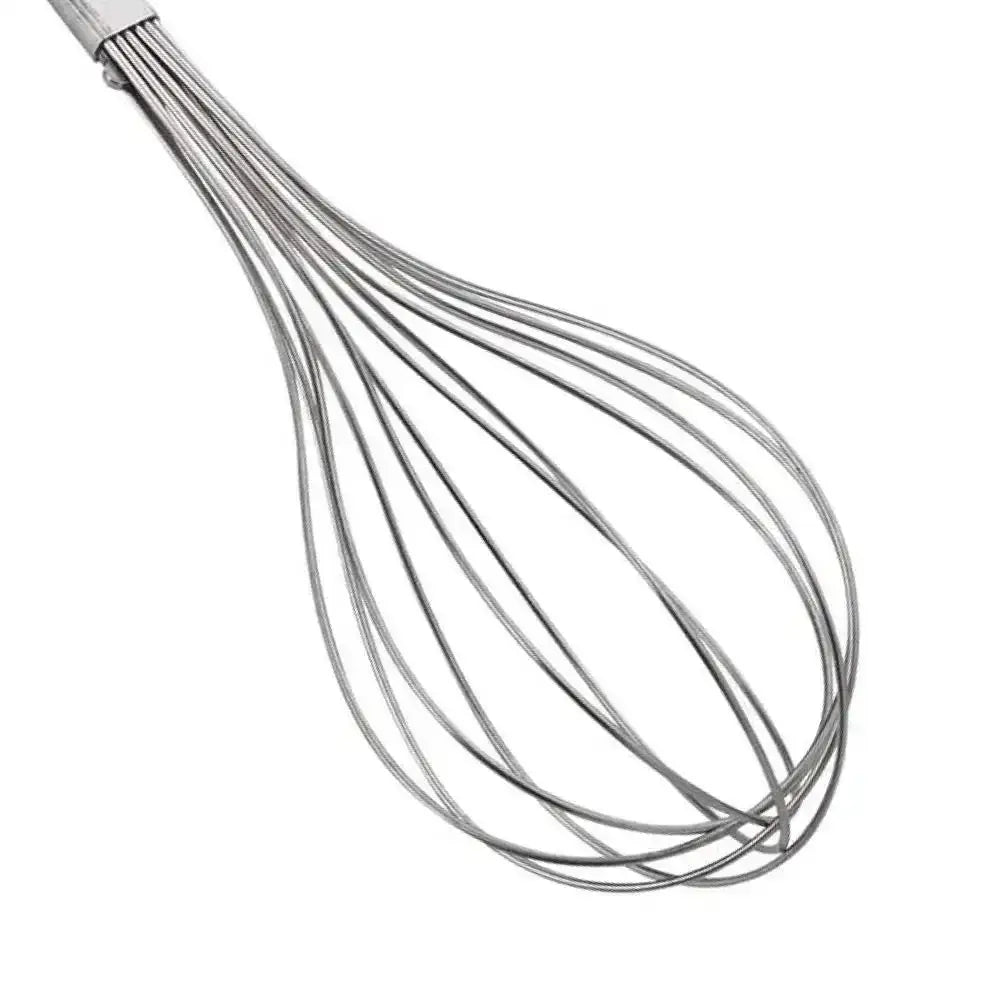 Metal whisk on a white background