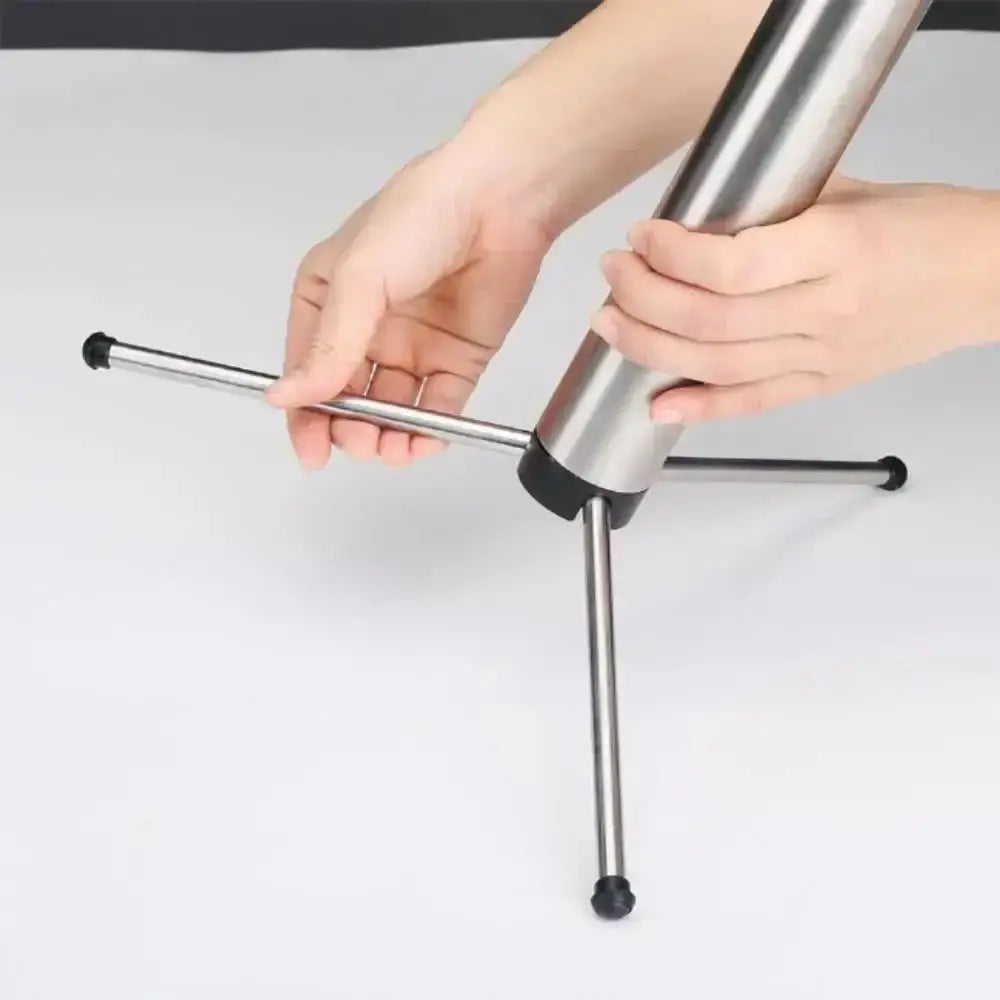pasta drying stand legs being adjusted on a white background