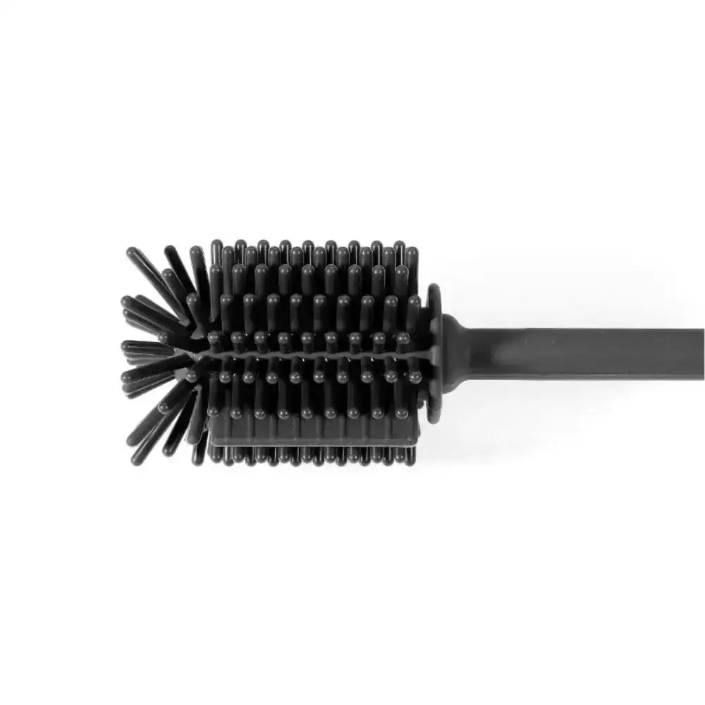 Black round dish brush on a white background