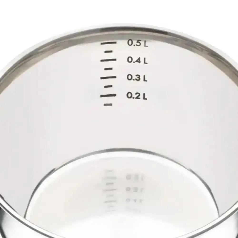 Clear measuring cup with volume markings on a white background