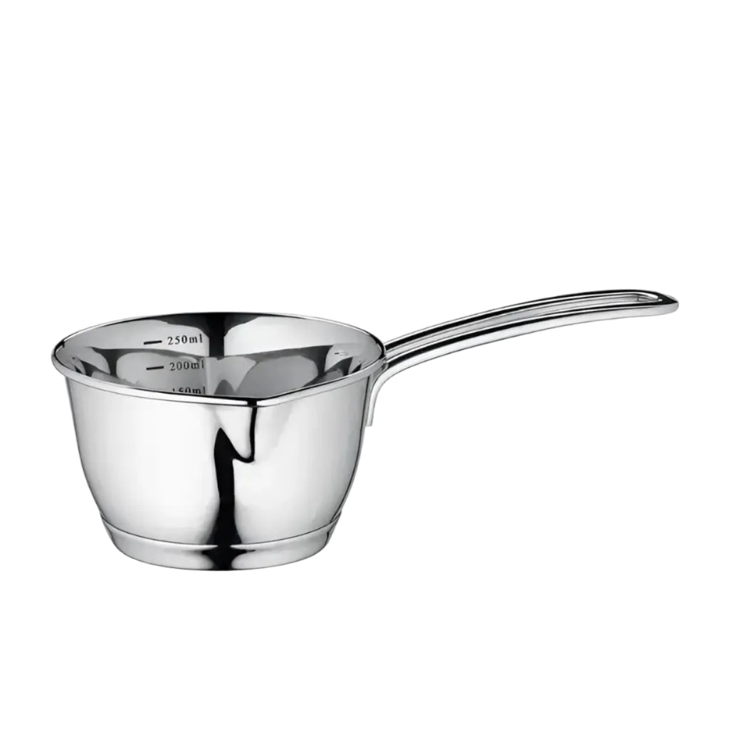 Stainless steel measuring cup on a white background