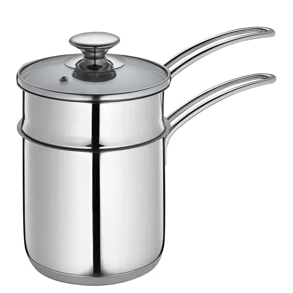 Stainless steel milk frothing pitcher on a white background